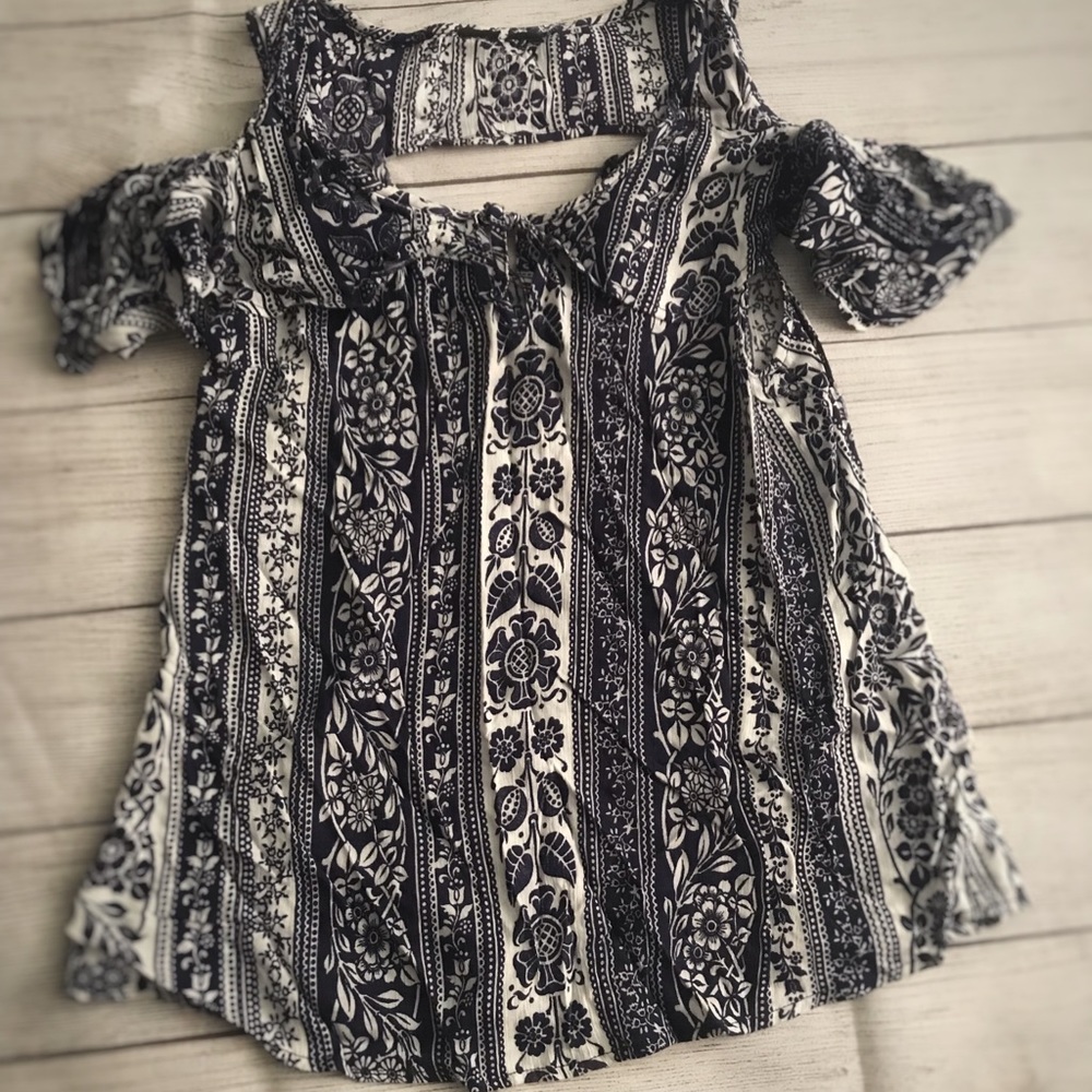 Blue and white blouse.